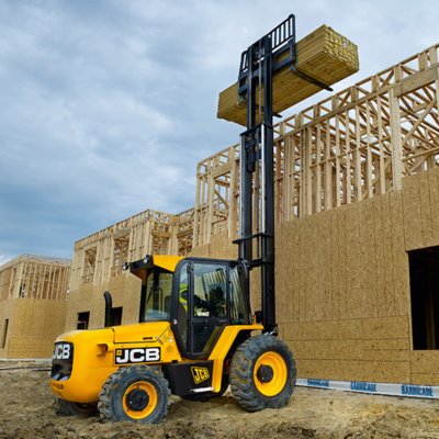 Forklift unloading machinery and industrial equipment in Southall